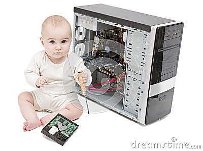 Young child working on open computer Stock Photo