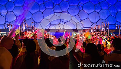 Young Chinese welcome APEC leaders upon their arrival at China National Swimming Center Editorial Stock Photo