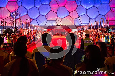 Young Chinese welcome APEC leaders upon their arrival at China National Swimming Center Editorial Stock Photo