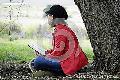 Young Christian woman meditating Gods word in praise and worship Stock Photo