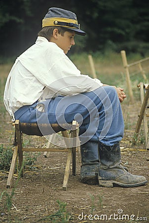 young Civil War participant in camp scene during recreation of Battle of Manassas, Virginia Editorial Stock Photo