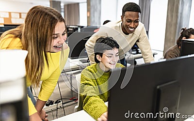 Young classmates studying together inside classroom Stock Photo