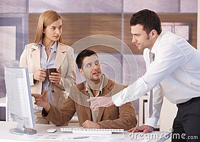 Young colleagues teamworking Stock Photo