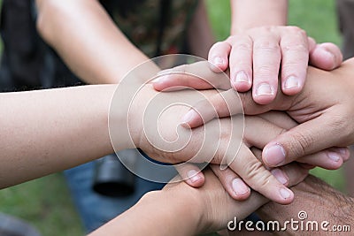 young college student joining hand, start up business team touch Stock Photo