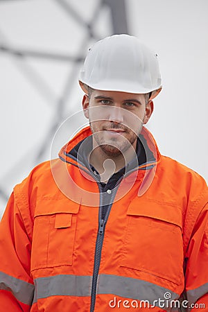 Young confident engineer or architect looking at camera on a construction site Stock Photo