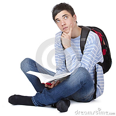 Young contemplative male student with book Stock Photo