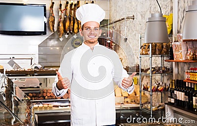 Young cook at butcher store Stock Photo