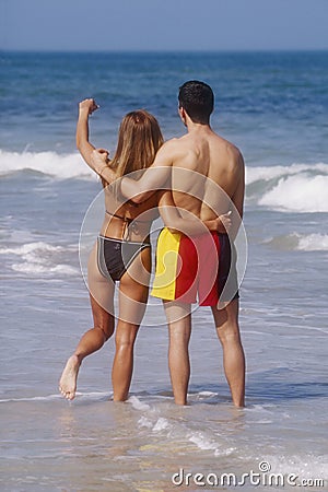 Young couple on beach Editorial Stock Photo