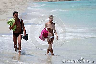 Young couple on the beach Editorial Stock Photo