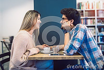 Couple in cafe enjoying the time spending with each other Stock Photo
