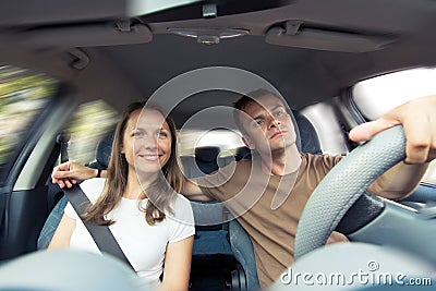 Young couple in a car Stock Photo