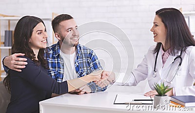 Young couple at doctor`s office during visit Stock Photo