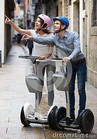 Young couple driving segways Stock Photo