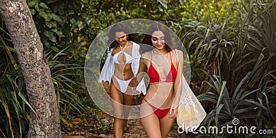 Young Couple Exploring Exotic Rainforest, the Way to Secret Beach Stock Photo