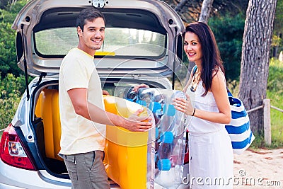 Young Couple Going To The Beach Stock Photo