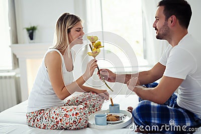 Young couple having romantic times on bed Stock Photo