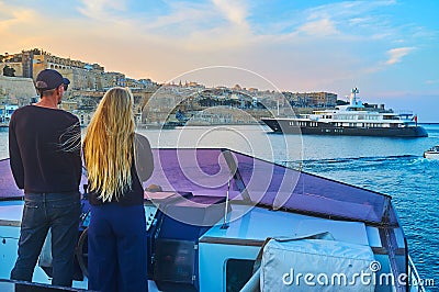 The couple at the helm, Valletta, Malta Editorial Stock Photo