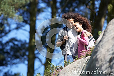 Young Couple On Hike In Countryside Stock Photo