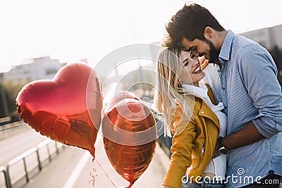 Young couple hugging dating and kissing outdoor Stock Photo