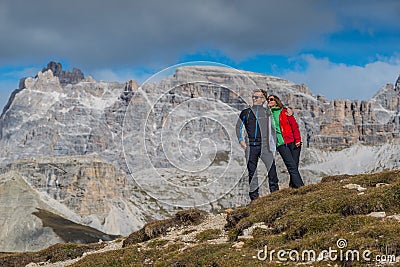 Young couple in italien dolomites, loving nature and climbing, tre cime di lavaredo Stock Photo