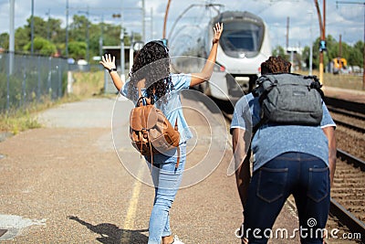 young couple just missed train home Stock Photo