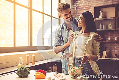 Young couple in kitchen Stock Photo