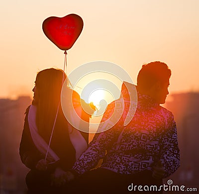 Young couple in love balloon heart Editorial Stock Photo