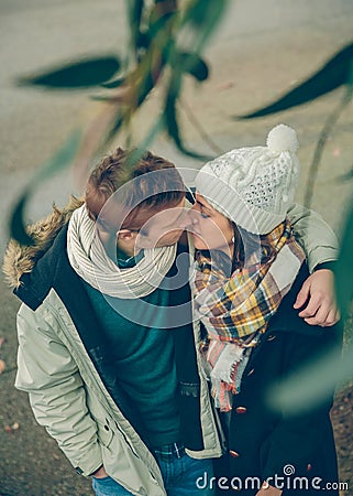 Young couple in love embracing and kissing Stock Photo