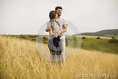 Young couple in love outside in spring nature Stock Photo