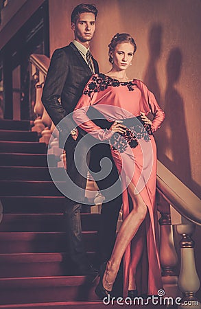 https://thumbs.dreamstime.com/x/young-couple-luxury-interior-beautiful-well-dressed-standing-steps-41203291.jpg