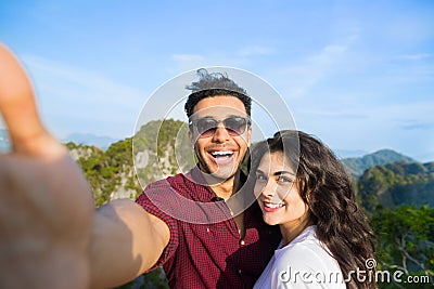 Young Couple Mountain View Point Happy Smiling Man And Woman Taking Selfie Photo On Cell Smart Phone Asian Holiday Stock Photo