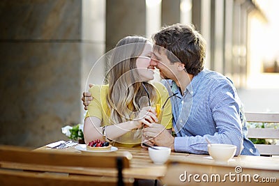 Young couple in the outdoor cafe Stock Photo