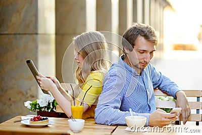 Young couple in the outdoor cafe Stock Photo