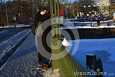 A young couple in Peter and Paul fortress in Saint-Petersburg, Russia. Editorial Stock Photo