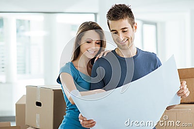 Young couple planning their new house Stock Photo