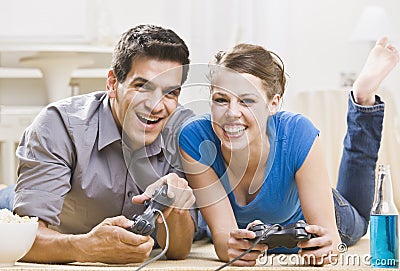 Young Couple Playing Video Games Stock Photo