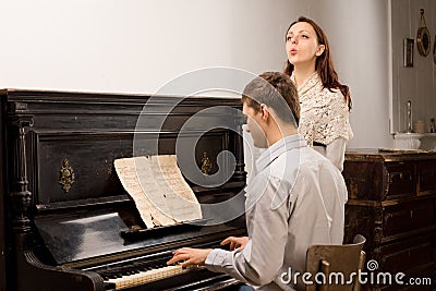 Young couple practicing a musical duet Stock Photo