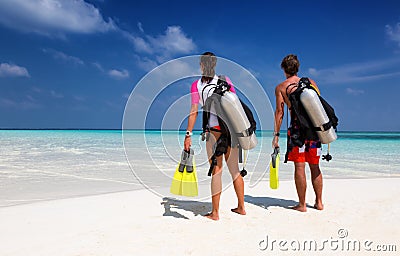 Young couple in scuba diving gear Stock Photo