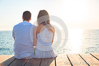 Young Couple By The Sea Stock Photo