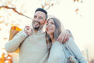 Young couple with shopping bags Stock Photo