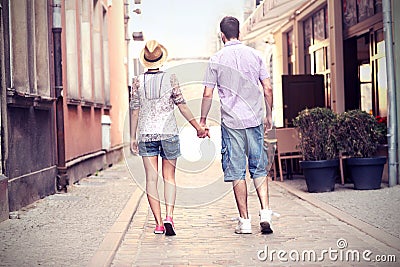 Young couple strolling about the city Stock Photo