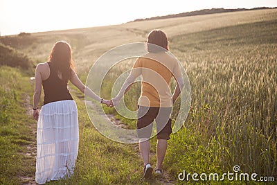 A young couple in sunset Stock Photo