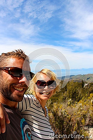 Young couple take quick slefie in New Zealand Abel Tasman park Nelson area Stock Photo