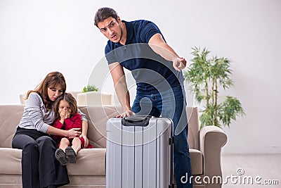 Young couple and their daughter in family conflict concept Stock Photo