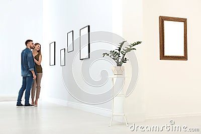 Young couple viewing exposition Stock Photo