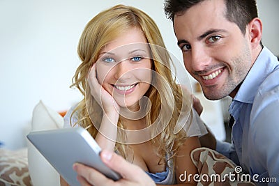 Young couple websurfing on internet Stock Photo