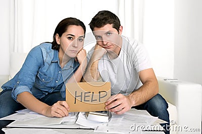 Young couple worried at home in bad financial situation stress Stock Photo