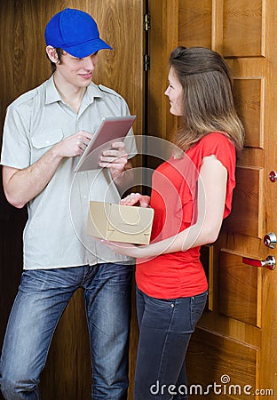 Young courier deliver package Stock Photo