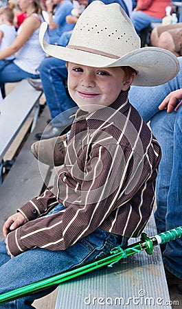 Young Cowboy with a Ninja Sword. Stock Photo