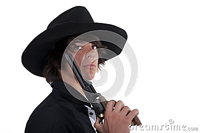 Young cowboy with revolver Stock Photo